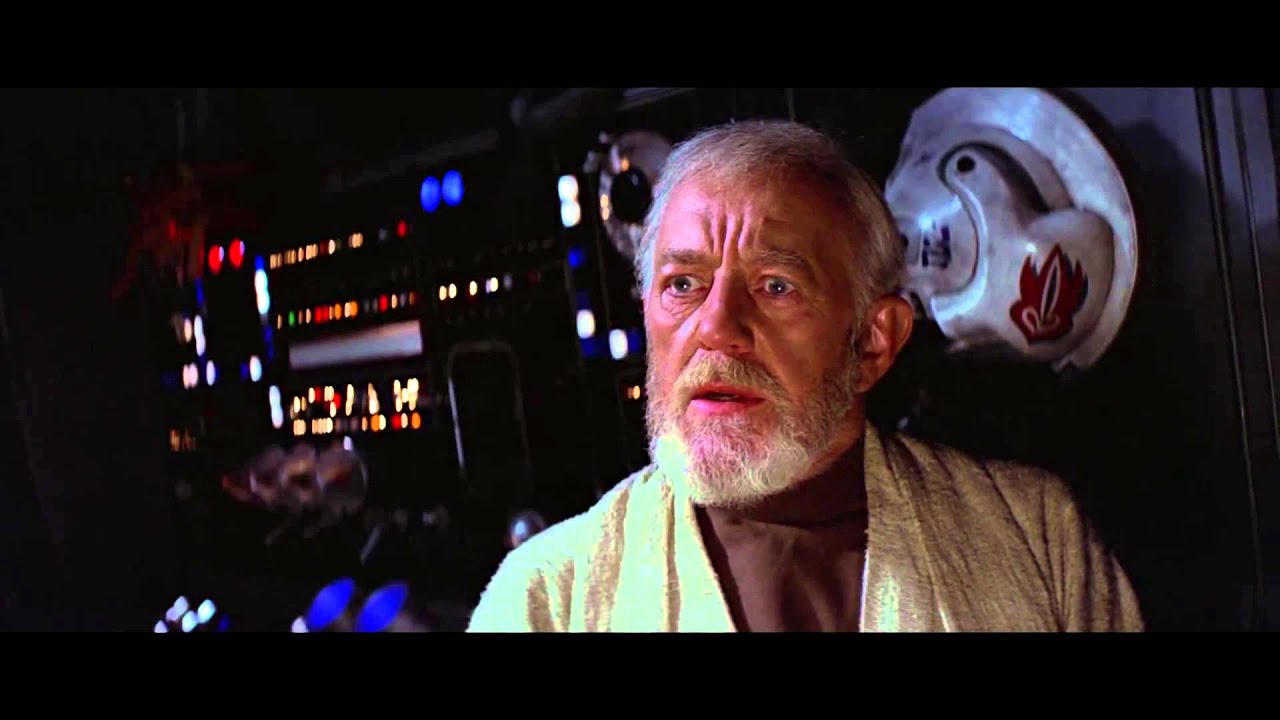 Obi Wan Kenobi in the Millenium Falcon showing a shocked expression
